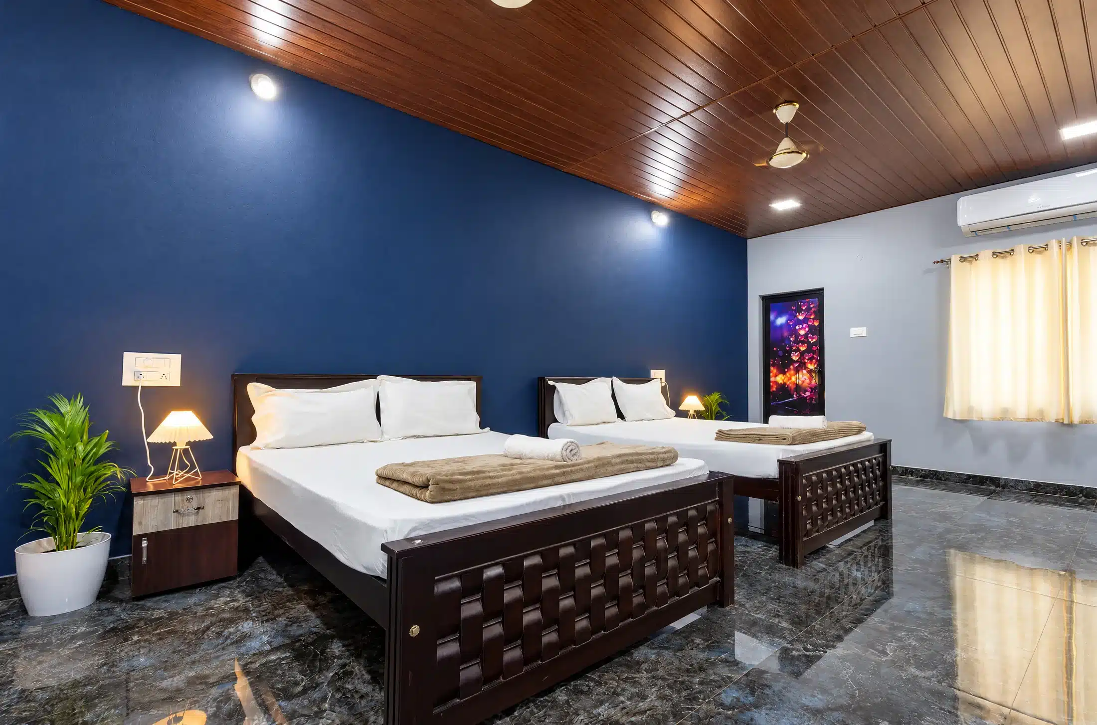 Family room from a second angle showing both queen beds